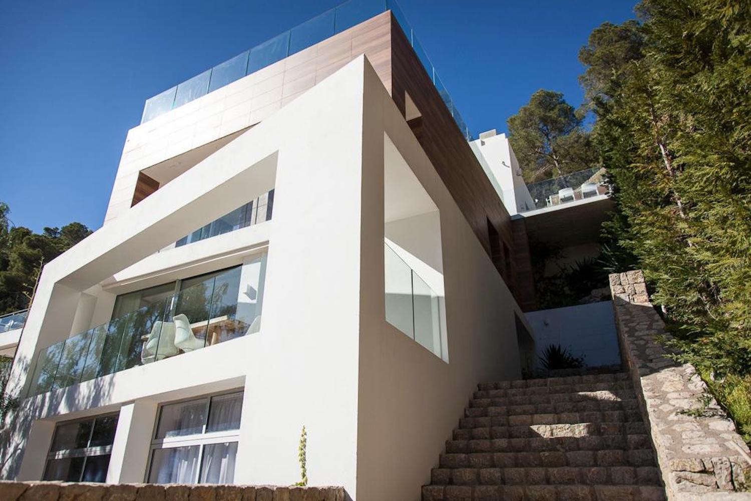 Resa estates Ibiza modern villa Cala llonga golf sale te koop house exterior day.jpg